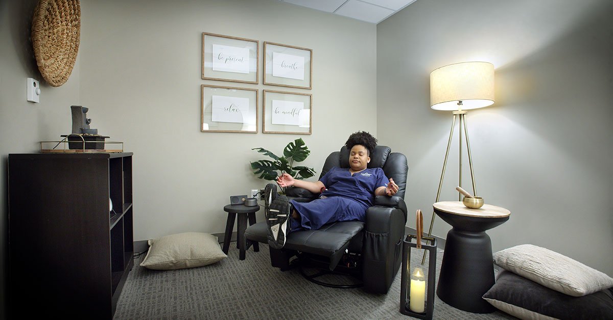 Employee using BGREEN equipment for MSK wellness at Singapore workplace