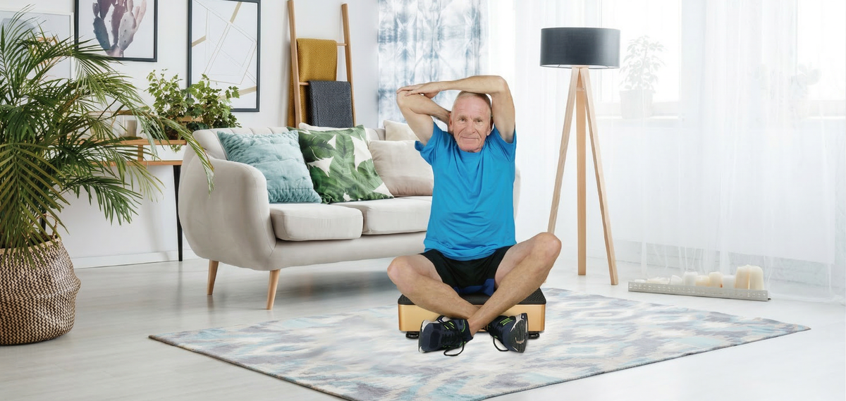 Senior man exercising at home using Turtlegym app